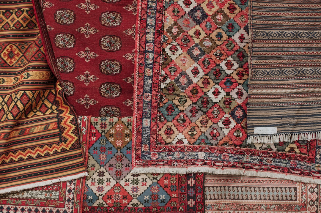 red white and black floral textile