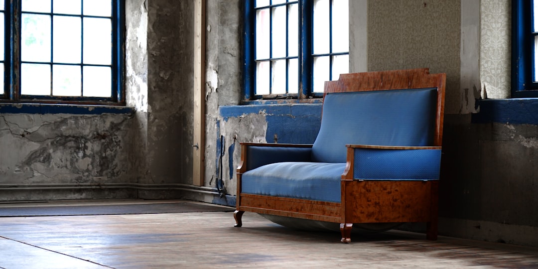 a blue chair in a room